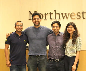 Group photo of four Kellogg students who competed in the Morgan Stanley Sustainable Investment Challenge